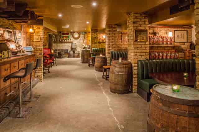 Cozy rustic venue with brick walls for intimate gatherings and private events.