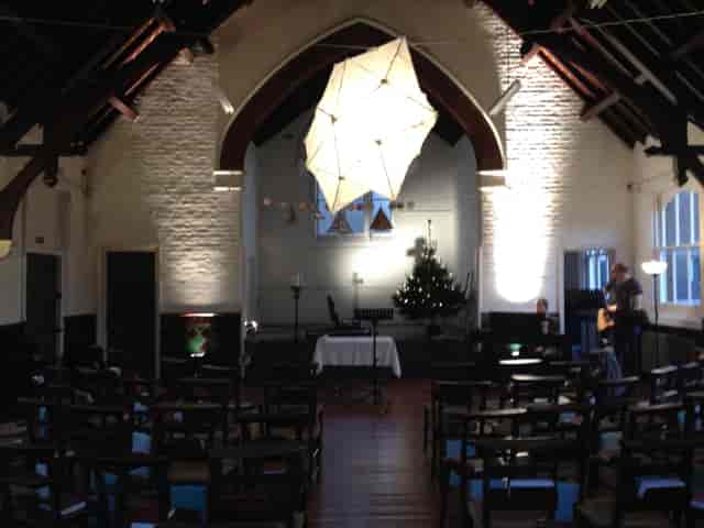 Cozy event space in Upper Hall, Saint Barnabas Dalston, perfect for meetings and celebrations.
