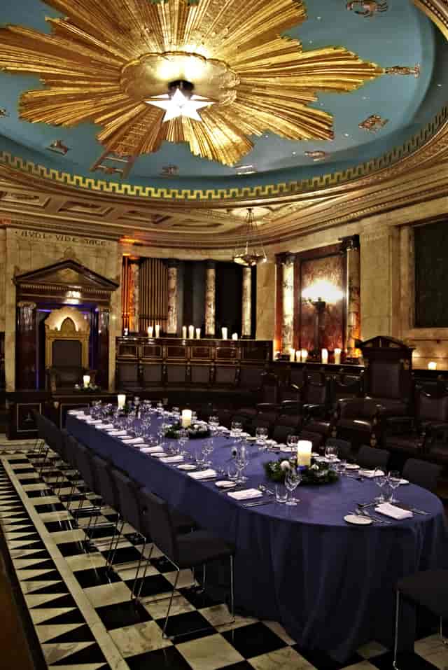 Masonic Temple event space with elegant table setting for corporate gatherings and upscale dinners.