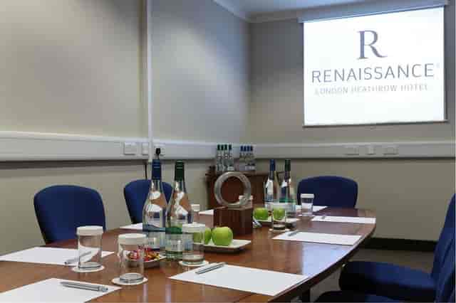 Lobby Room 2 at Renaissance London Heathrow Hotel, polished table for corporate meetings.