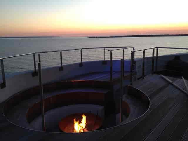 Central Atrium in No Man's Fort with cozy fire pit, ideal for cocktail receptions.