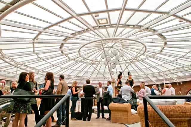 Vibrant networking event at Cabaret Club, No Man's Fort with modern decor and natural light.