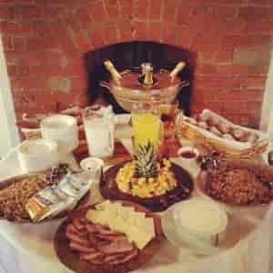 Boardroom buffet setup with fresh fruits and cheeses for meetings or events at No Man's Fort.