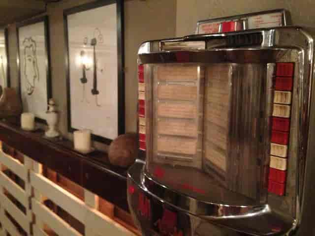 Vintage jukebox in Cellar Bar, The Crown and Sceptre, ideal for retro-themed event receptions.