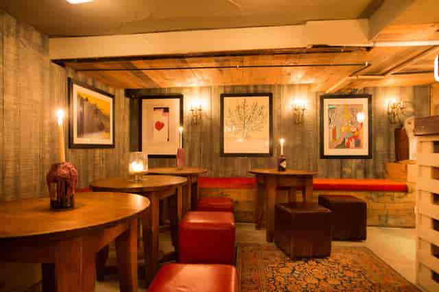 Subterranean rustic pub lounge for intimate VIP receptions and networking events.