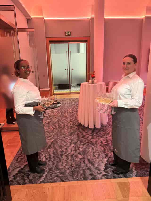 Rolls Royce at Prince Philip House with servers for a sophisticated networking event.