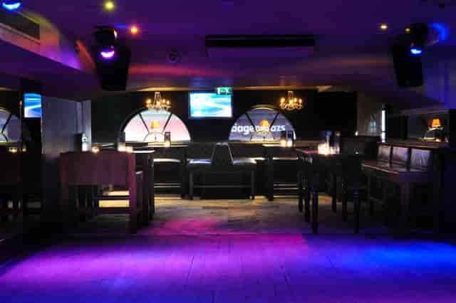 Stylish event space at Ruby Blue with modern bar, perfect for networking and private gatherings.