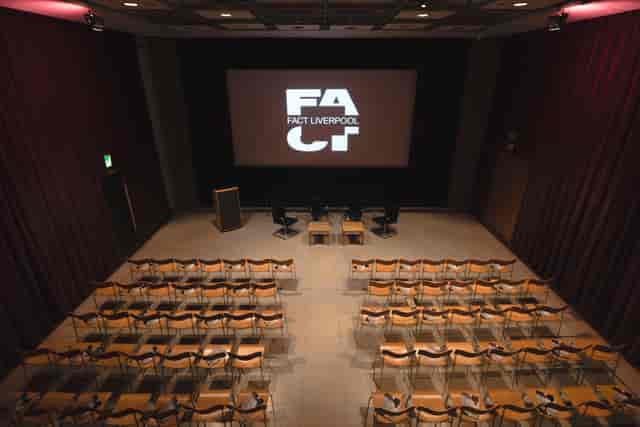 FACT Liverpool venue with stage setup, ideal for presentations and panel discussions.