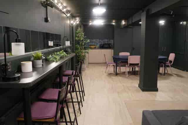 Modern meeting space with flexible seating for workshops at Young Actors Theatre Islington.