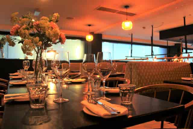 Semi-private Mezzanine at Brasserie Blanc, elegant dining table for corporate events.