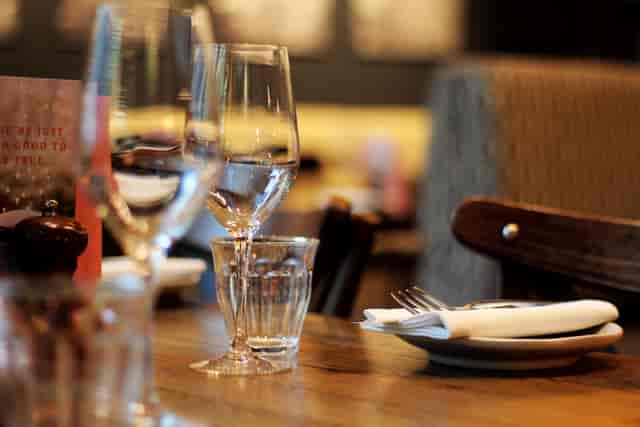 Elegant dining table setup at Brasserie Blanc for intimate meetings and events.