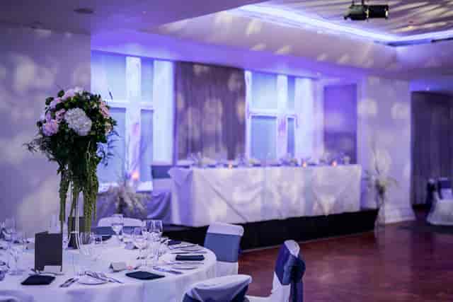 Great Eastern Suite banquet setup with elegant tables for weddings and corporate events.