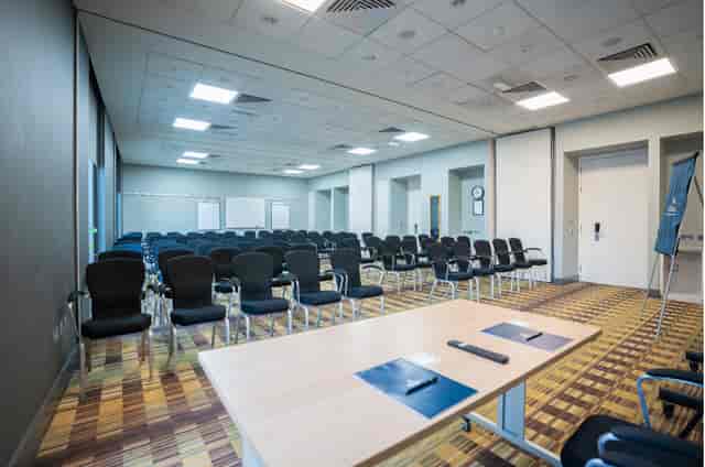 Meeting Room at Hilton Deansgate, organized layout for efficient corporate events.