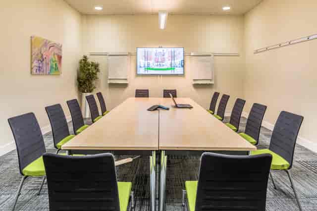 Modern meeting room in BMA House, ideal for workshops with ample seating and natural light.