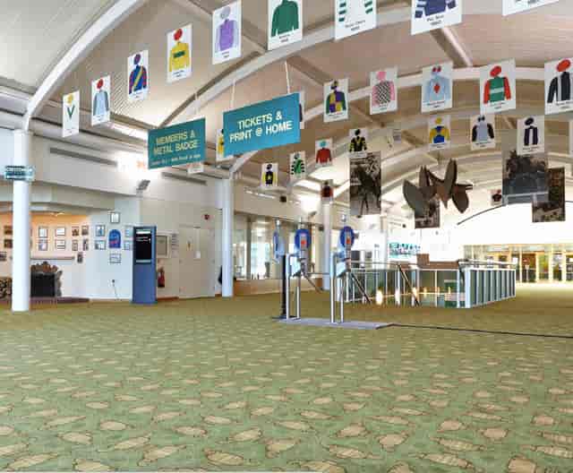 Cheltenham Racecourse Hall of Fame venue with clear signage for conferences and exhibitions.
