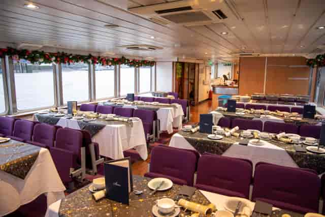 MV Mayflower Garden event space with elegant purple seating for corporate gatherings.