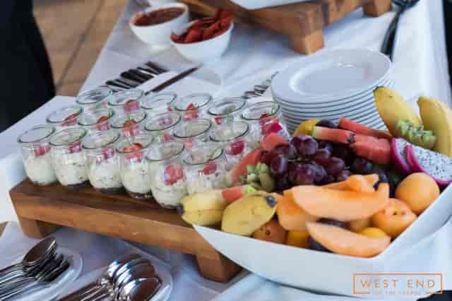 Catering display of dessert cups and fruit at The Vessel for networking events or conferences.