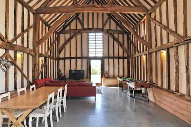 Rustic Rowley Barn with exposed beams, perfect for events and gatherings.