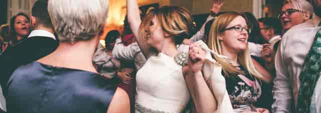 Lively celebration in Blue Lounge, Didsbury House Hotel, showcasing elegance and inclusivity.