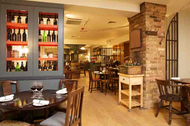 Cozy dining area at Bangers Bar and Grill, perfect for intimate gatherings and events.
