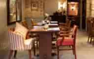 Cozy dining area at Bangers Bar and Grill, perfect for intimate events and networking.