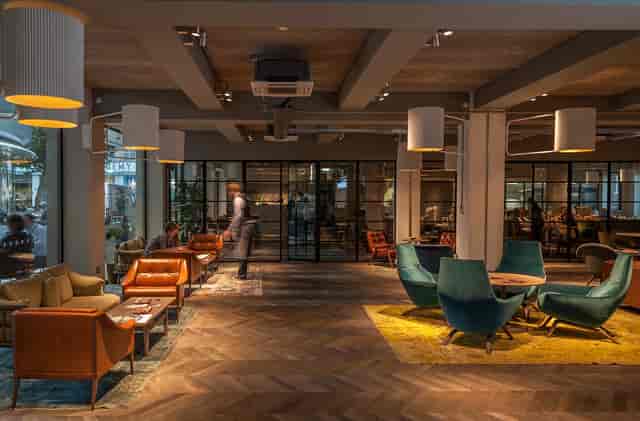 Stylish Event Space & Terrace for meetings and gatherings with comfortable seating.