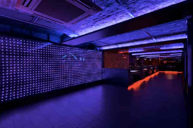 Modern event space at Baa Bar with dynamic LED lighting for nightlife and corporate events.