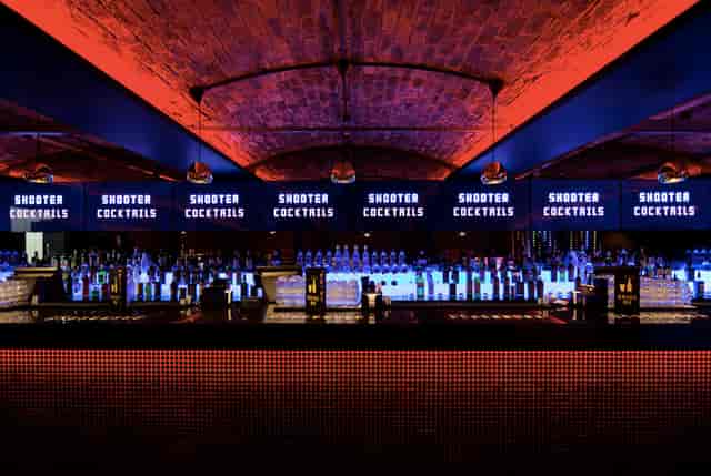 Vibrant Baa Bar venue with LED display for shooter cocktails, ideal for events and gatherings.