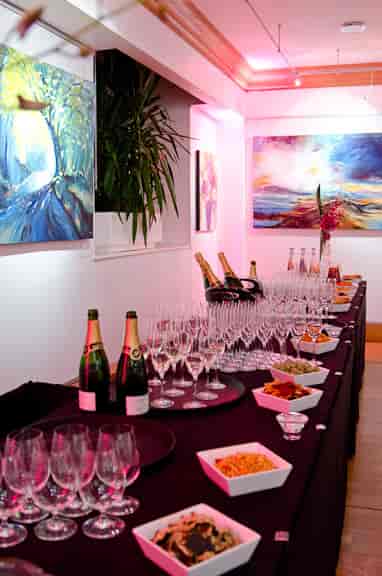 Elegant champagne display at Knapp Gallery for networking events and celebrations.
