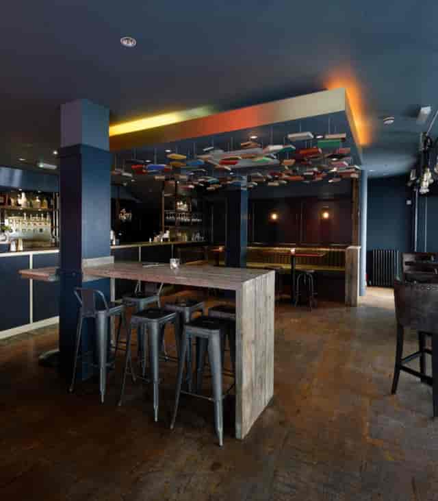 Clerkenwell & Social venue with industrial high-tops for intimate networking and evening events.