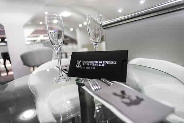 Elegant table setting with glassware at Coppell 2010, Selhurst Park for upscale events.