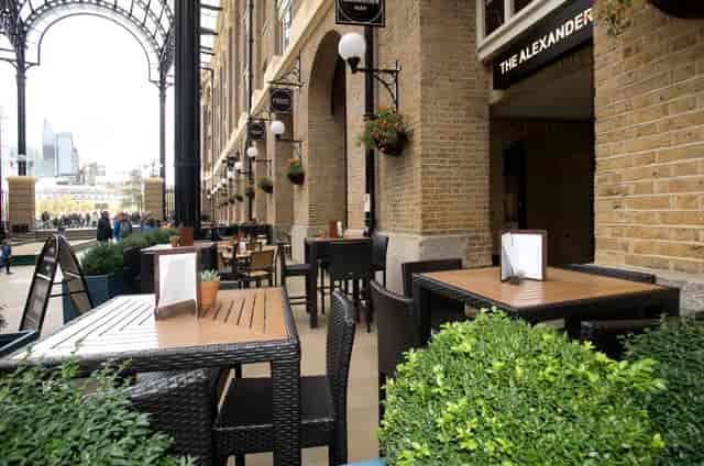 Outdoor dining area at The Alexander Hay, perfect for casual meetings and events.