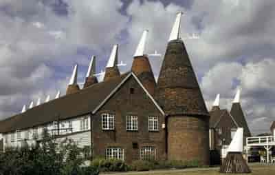 The Dray Marquee at Hop Farm, a rustic venue with oast houses for events.