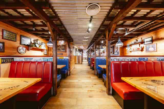 Vibrant rustic dining space in The Beaufort Room, perfect for casual gatherings and events.