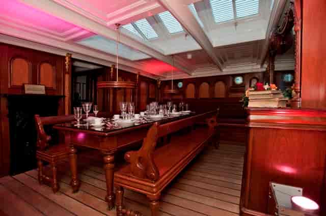 Masters Saloon in Cutty Sark: elegant meeting space with wooden paneling for networking events.