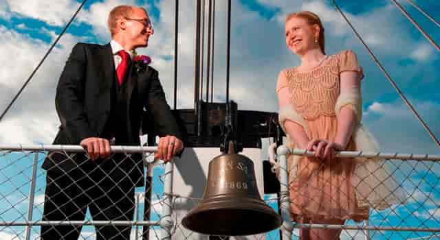 Couple celebrating wedding on The Weather Deck, Cutty Sark, unique nautical venue.