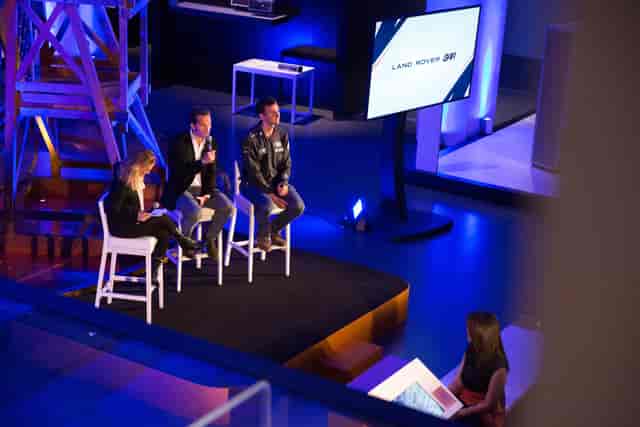 Panel discussion at The Science Museum with speakers and modern staging for engagement.