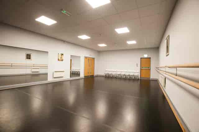 Versatile event space with mirrored walls for workshops and meetings at Adagio School of Dance.