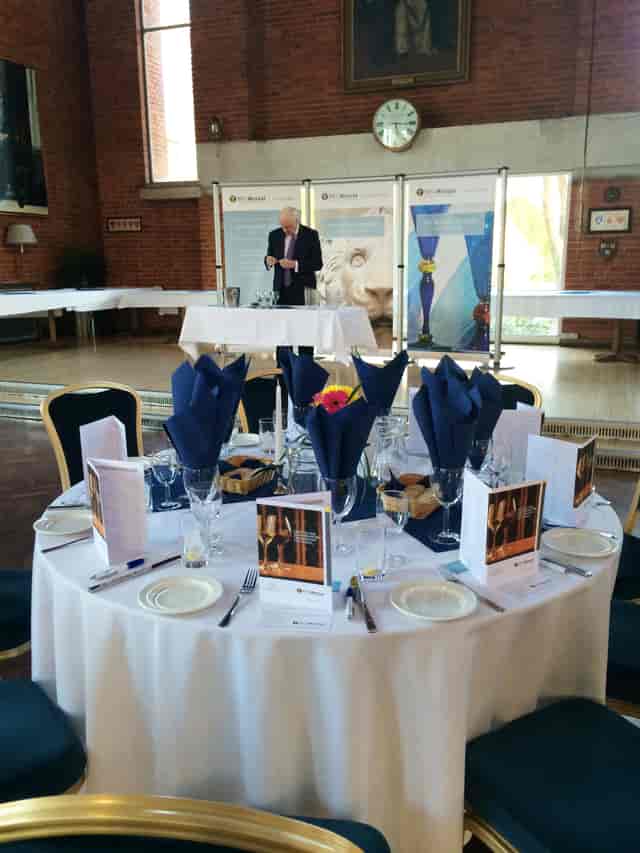 Norwood Hall event space with elegant dining setup for formal gatherings and presentations.