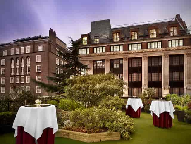 Trianon Room outdoor event space with elegant tables, perfect for cocktail receptions in London.