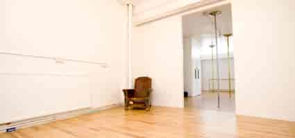 Minimalist event space in London Dance Academy, ideal for workshops and gatherings.