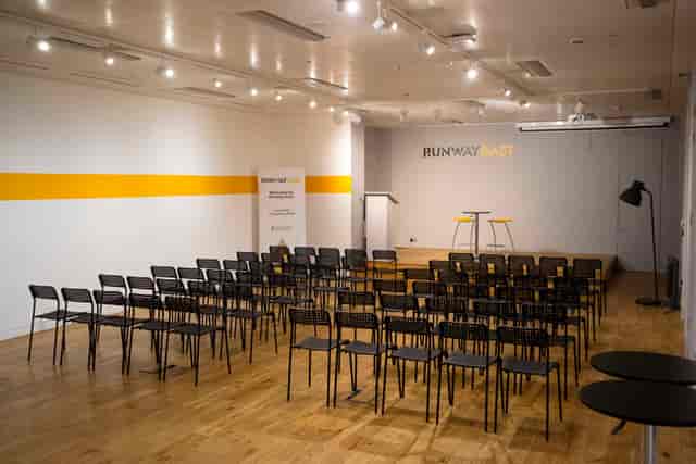 Theater-style event space at The Engine Room, Runway East Moorgate for corporate presentations.