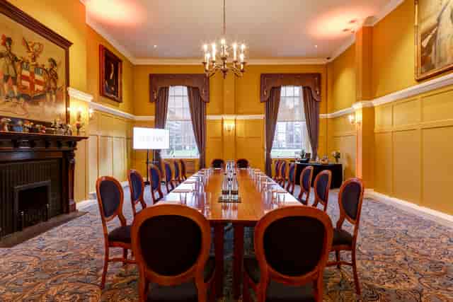 Queen's Room at HAC: elegant meeting space with rich decor for corporate events.