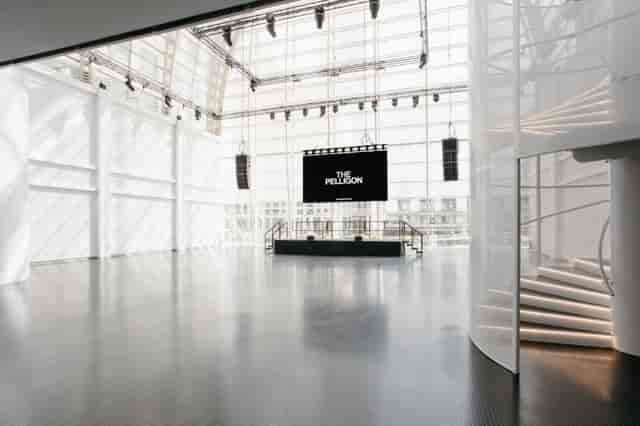 Modern event venue Main Hall in The Pelligon with high ceilings, ideal for conferences.