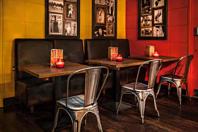 Cozy dining area at The Mezzanine, perfect for networking events and casual meetings.