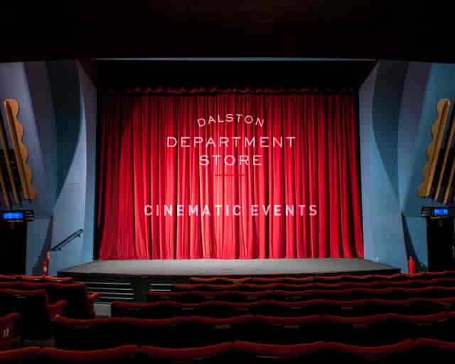 Rio Cinema auditorium with red curtain, ideal for film screenings and corporate events.