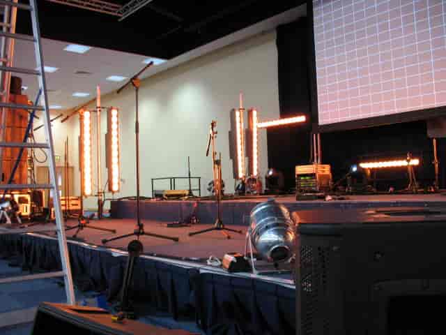 Thames Hall stage setup with professional lighting for event production in Oxford.