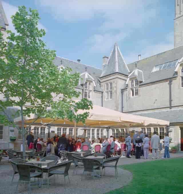 Elegant outdoor event space at Le Gothique with historic architecture, perfect for weddings.