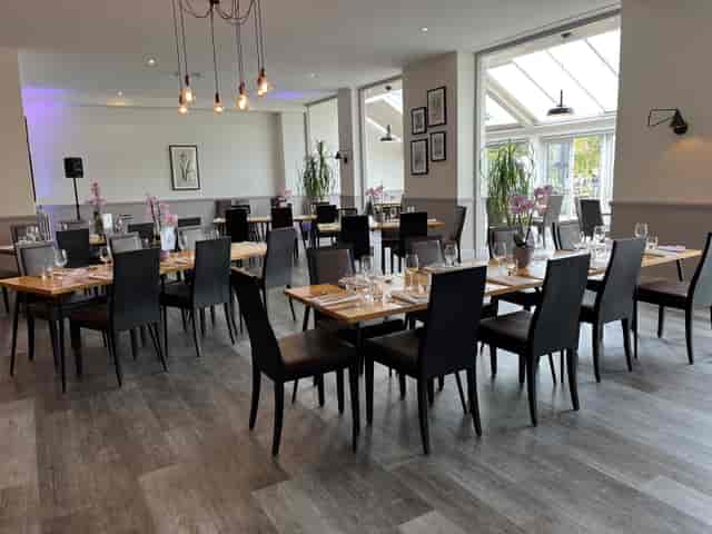 Tulip Tree Room at RHS Garden Wisley, elegant dining space for corporate events and gatherings.