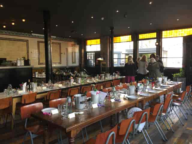 Elegant dining table in Coin Laundry venue for corporate events and celebrations.